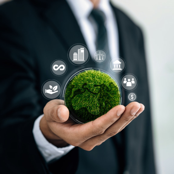 ISO 14001 Environmental Management System – Businessmen holding world to Organization Sustainable development environmental.
